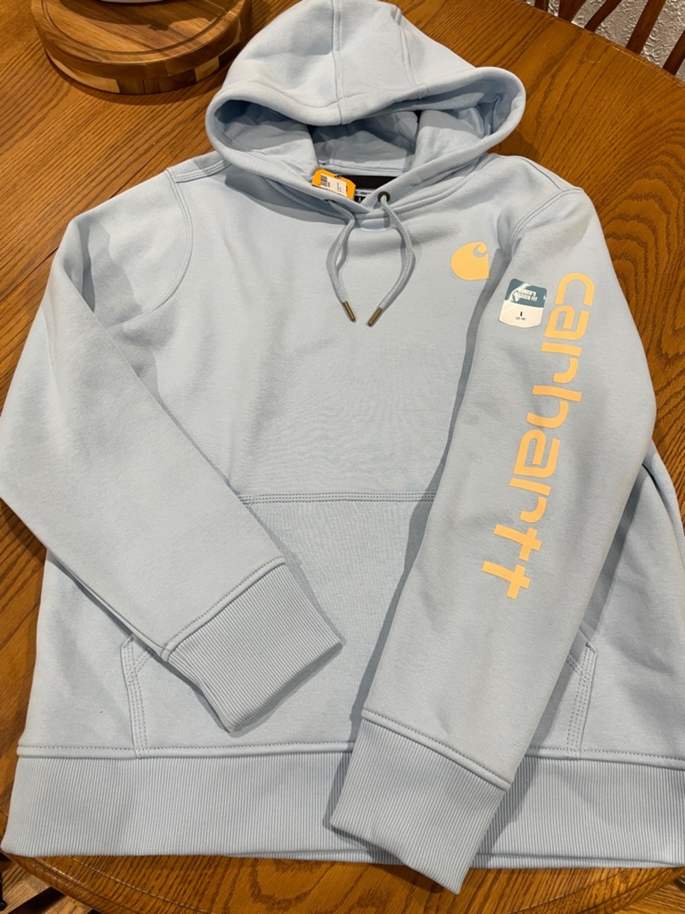 Carhartt Light Blue Pullover Hoodie with peach color Logo